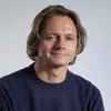Ritratto di Giulio Xhaet, Partner e Head of Communication, Newton Group